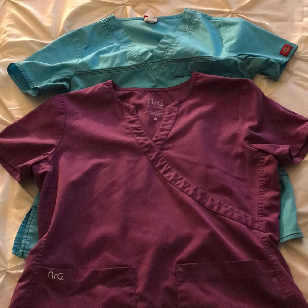 Two solid colored scrub tops
